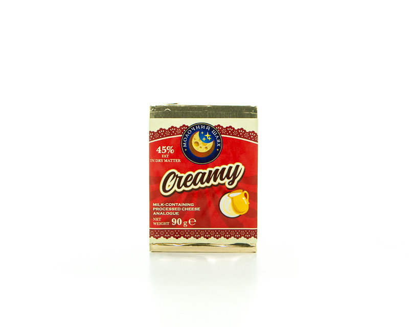 “Creamy” Milk-Containing Processed Cheese Analogue